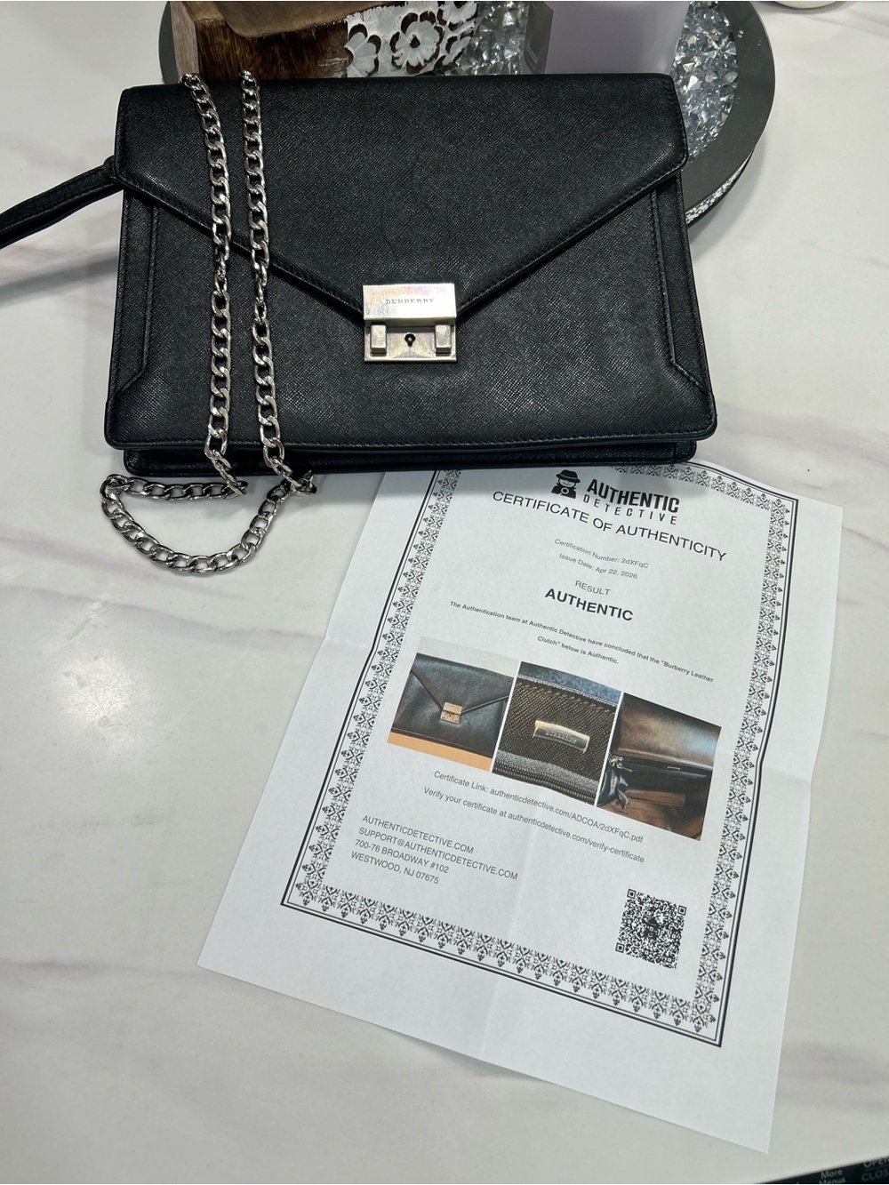 Authentic Burberry clutch with added chain